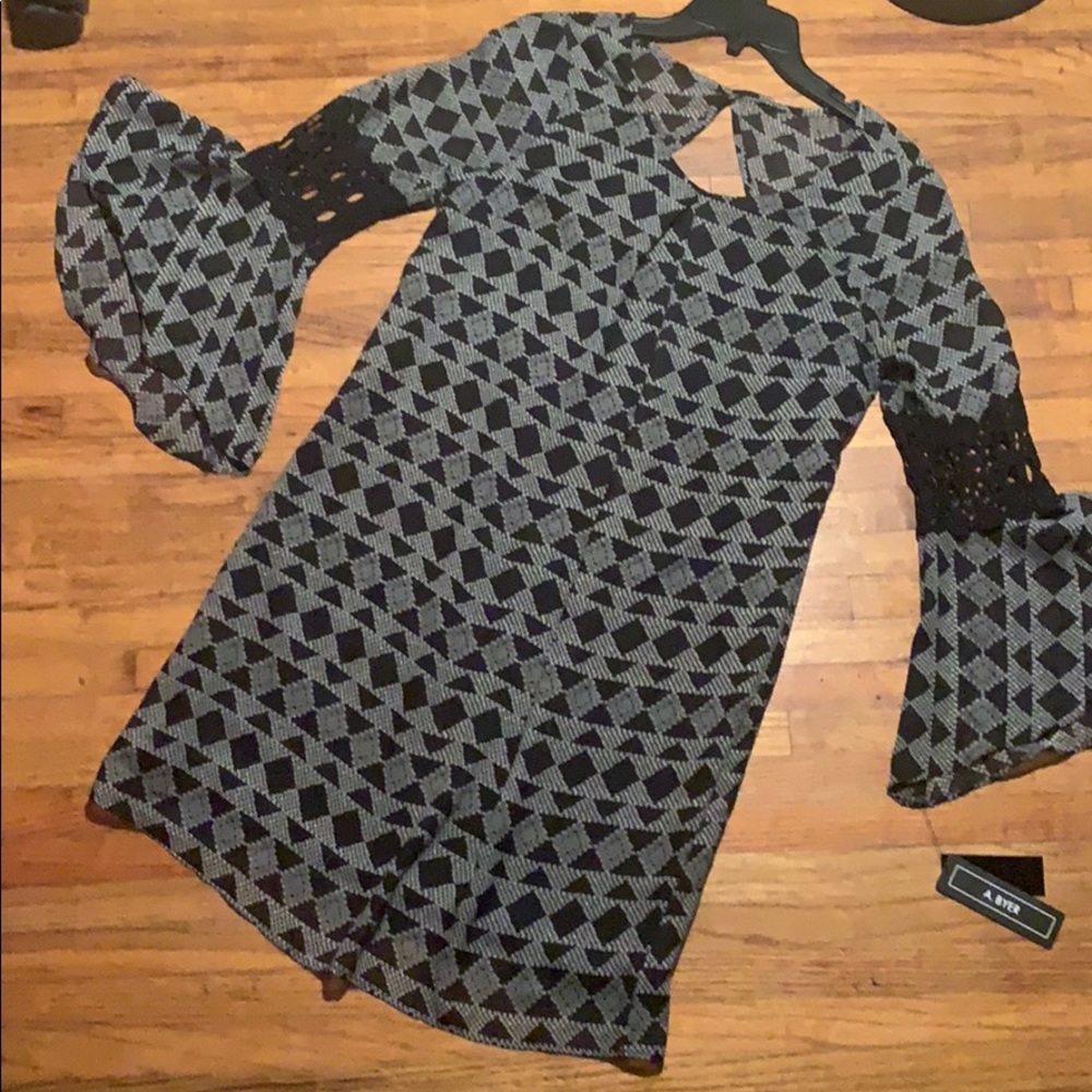 A Byer bell sleeve keyhole black and white dress